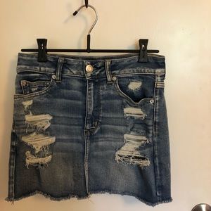 Ripped denim skirt